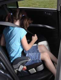 at what age can children sit in the front seat of a car